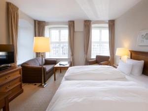Voodi või voodid majutusasutuse Bergström Hotel Lüneburg toas