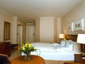 Voodi või voodid majutusasutuse Bergström Hotel Lüneburg toas