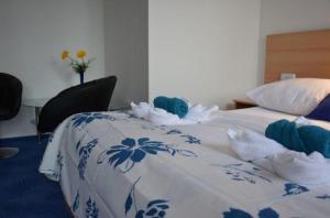 Voodi või voodid majutusasutuse Hotel O.K. 1 toas