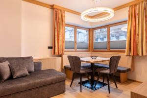 Posezení v ubytování Dorfresort Kitzbühel by ALPS RESORTS
