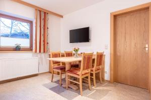 TV a/nebo společenská místnost v ubytování Dorfresort Kitzbühel by ALPS RESORTS