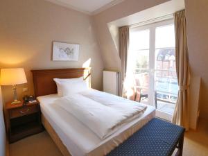 Voodi või voodid majutusasutuse Bergström Hotel Lüneburg toas