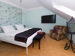 TV/Unterhaltungsangebot in der Unterkunft DORMERO Hotel München-Kirchheim Messe