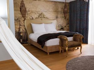 Postel nebo postele na pokoji v ubytování DORMERO Hotel München-Kirchheim Messe
