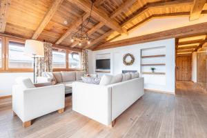 TV a/nebo společenská místnost v ubytování Dorfresort Kitzbühel by ALPS RESORTS
