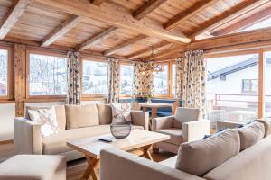 Posezení v ubytování Dorfresort Kitzbühel by ALPS RESORTS