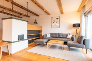 TV a/nebo společenská místnost v ubytování Dorfresort Kitzbühel by ALPS RESORTS