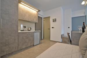 Kuchyň nebo kuchyňský kout v ubytování MAK Apartments