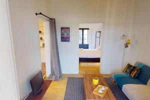 Letto o letti in una camera di Narrow Street Suite
