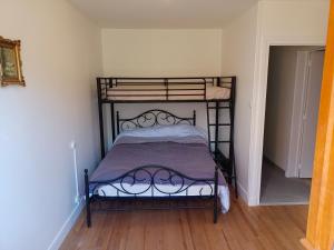 Кровать или кровати в номере Gîtes de Voingt