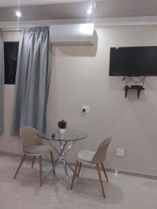TV tai viihdekeskus majoituspaikassa Mapulaneng Guest House