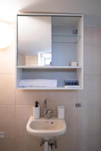 A bathroom at PORT CITY HAIFA - Downtown Studio with Gallery nxt German Colony