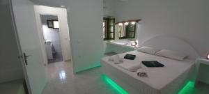 A bed or beds in a room at Leros Eleonas ApartmentS