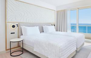 Postel nebo postele na pokoji v ubytování Le Meridien Lav Split
