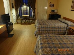 Postel nebo postele na pokoji v ubytování Motel Lyse