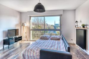 Posteľ alebo postele v izbe v ubytovaní Bourgonnier 19 - Charmant studio à Angers