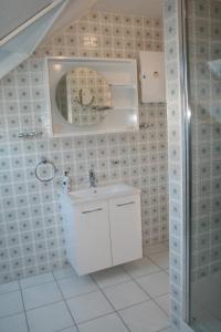 Ένα μπάνιο στο Ferienwohnung Baude