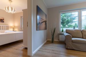 Postel nebo postele na pokoji v ubytování Haus Rückenwind Appartement 1 Rückenwind - Ording