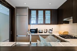 Kuchyň nebo kuchyňský kout v ubytování AYA Boutique - Fancy One Bedroom Apartment in Downtown Dubai