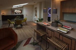 Posezení v ubytování APARTAMENTOS LOS QUESEROS