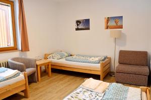 Postel nebo postele na pokoji v ubytování Balónový hotel a pivovar Radešín + 37 fotografií
