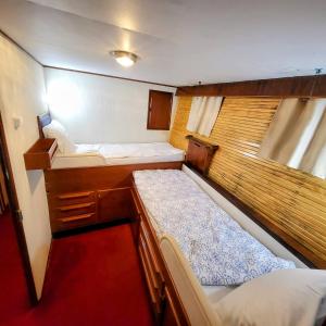 Postel nebo postele na pokoji v ubytování Don Maximo Yacht Hotel + 34 fotografií