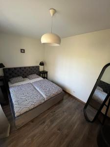 Postel nebo postele na pokoji v ubytování Une-max