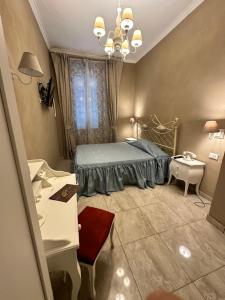 Postel nebo postele na pokoji v ubytování Boutique Hotel Calais Milano