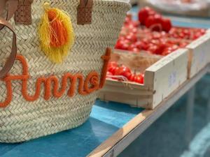 a bag of cherries on a counter in a market at GITE chez "Chambre D'Hôtes Sandra" in Annot