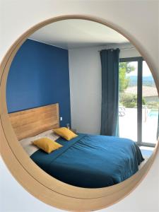 Łóżko lub łóżka w pokoju w obiekcie Villa Terra Vecchia, 6 ou 12 personnes, vue imprenable, piscine chauffée
