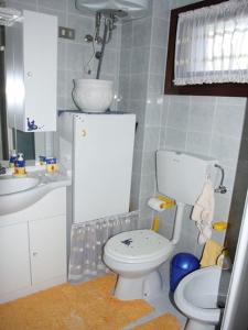 Koupelna v ubytování Adorable flat for 4 guests in Bibione Pineda
