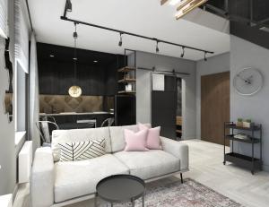 salon z białą kanapą i różowymi poduszkami w obiekcie N23 Dwupoziomowy Apartament Łódź Centrum Wi-Fi Klimatyzacja w Łodzi