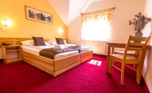Postel nebo postele na pokoji v ubytování B&B Bau