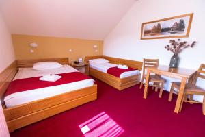 Postel nebo postele na pokoji v ubytování B&B Bau