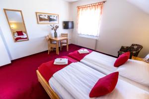 Postel nebo postele na pokoji v ubytování B&B Bau