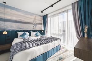 Voodi või voodid majutusasutuse Hotel Aurel Coast toas