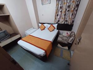 Krevet ili kreveti u jedinici u okviru objekta Kailash Hotel