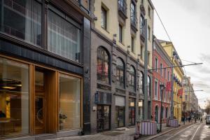a group of buildings on a city street at Bob W Sentralen in Oslo