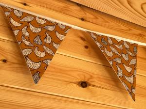 a tie hanging on a wooden table at Manor Farm Stay in Sutton on Sea