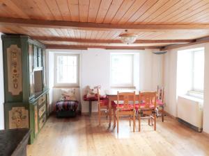 a dining room with a table and chairs at Ferienhaus Signina in Danis