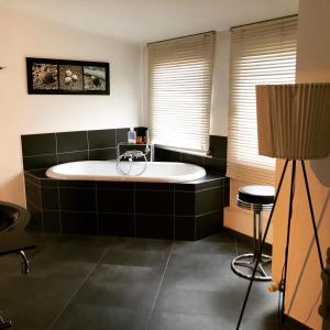 Fotografie z fotogalerie ubytování Guesthouse De Witte Merel Deluxe v destinaci Tessenderlo