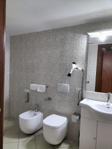 Koupelna v ubytování Hotel Ala Bianca + 5 fotografií