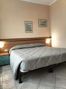 Postel nebo postele na pokoji v ubytování Hotel Ala Bianca