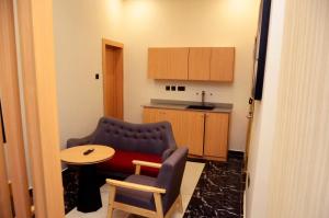 A kitchen or kitchenette at Ivy Hotel Emerald