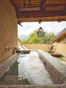 Πισίνα στο ή κοντά στο La Terrazza Naturas con romantica mini piscina calda sui tetti