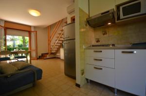 Kuchyň nebo kuchyňský kout v ubytování Villaggio Dei Gelsomini + 17 fotografií