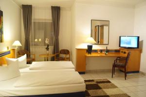 Postel nebo postele na pokoji v ubytování Hotel Rahlstedter Hof