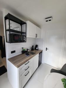 Η κουζίνα ή μικρή κουζίνα στο Appartement S2