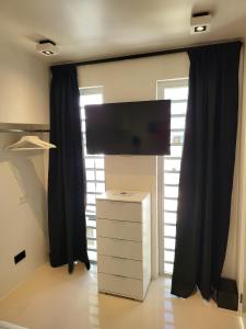 Μια τηλεόραση ή/και κέντρο ψυχαγωγίας στο Appartement S2