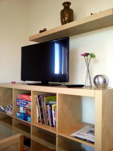 TV a/nebo společenská místnost v ubytování VuT Los Telares Muralla + 12 fotografií
